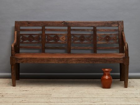 Teak Dutch Colonial Thick Bench from Sumatra with a Carved Flower Motif in the Back Medallion Online Sale